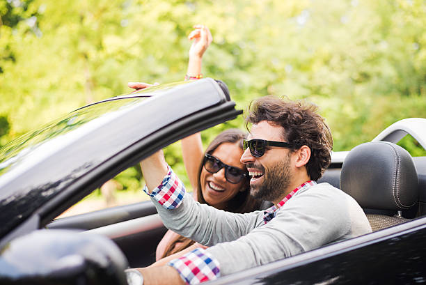 istock Enjoying in convertible 179405072