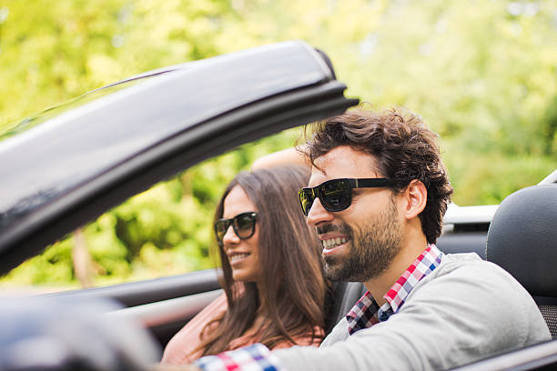 istock Couple in convertible 179405096