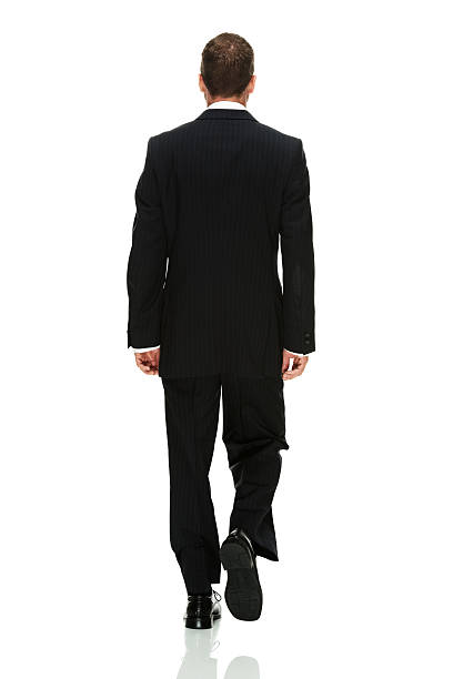 istock Rear view of a businessman walking 179405406