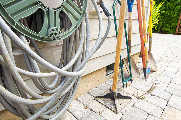 istock Gardening and Landscaping Tools by Watering Hose 179409736