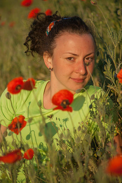 istock young beautiful woman on cereal field in summer 179409787