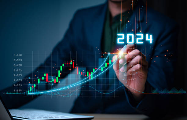 istock Businessman forecste analyze graph corporate future growth year 2024. New Goals with Plans and Visions for Next Year 2024, Opportunity, challenge and business strategy. 1794114281