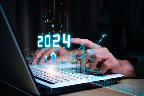 Businessman forecste analyze graph corporate future growth year 2024. New Goals with Plans and Visions for Next Year 2024, Opportunity, challenge and business strategy.