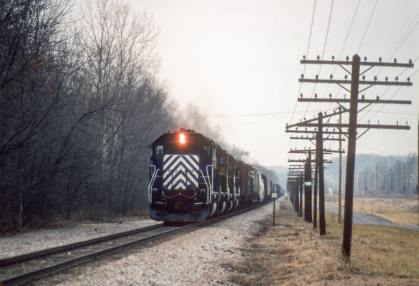 istock Trains - Train Approaches Crossing - 1997 1794127983