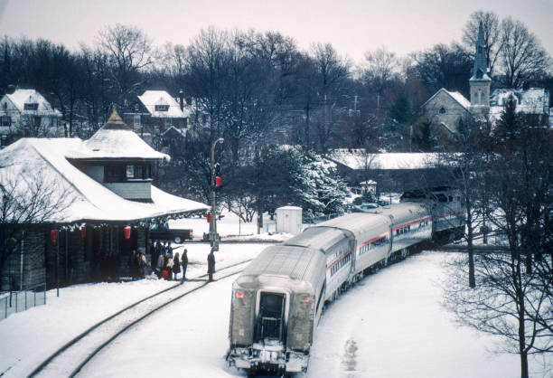 istock Trains in Snow - Passenger Train at Station - 1995 1794133713