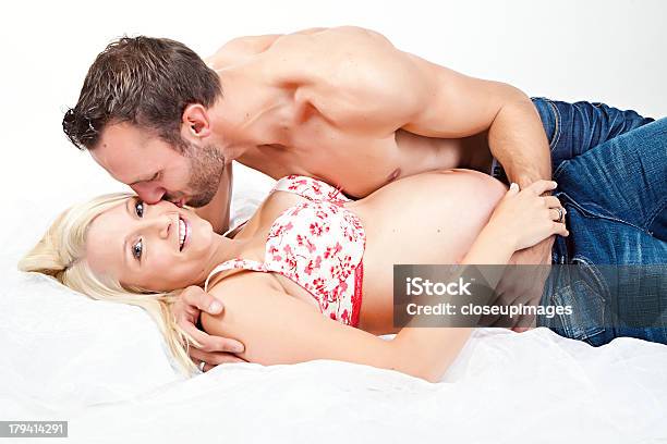 Pregnant Mother And Happy Father Stock Photo - Download Image Now - 20-29 Years, Abdomen, Adult