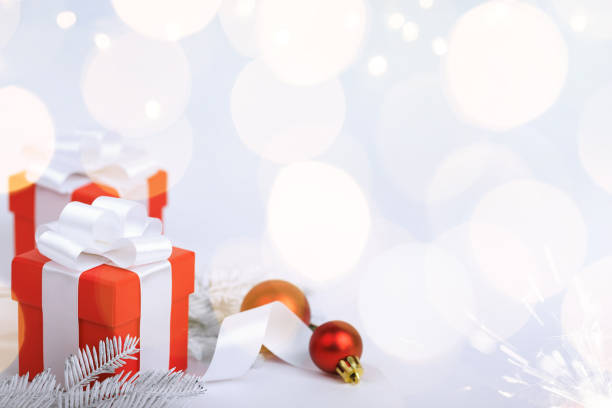 istock Christmas red gifts with decorations on white background 1794153836
