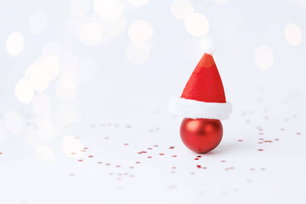 istock Christmas ball with Christmas hat on white background 1794171196