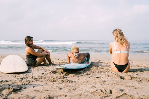 istock Young Man Teaching His Student How to Surf 1794176486