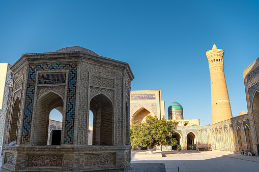 Inner courtyard of the Kalyan Mosque, part of the Po-i-Kalyan Complex in Bukhara, Uzbekistan. Sunset sky with copy space for text