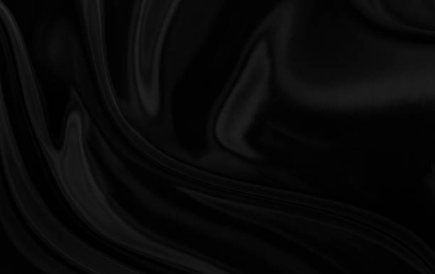 istock Black gray satin dark fabric texture luxurious shiny that is abstract silk cloth background with patterns soft waves blur beautiful. 1794216430