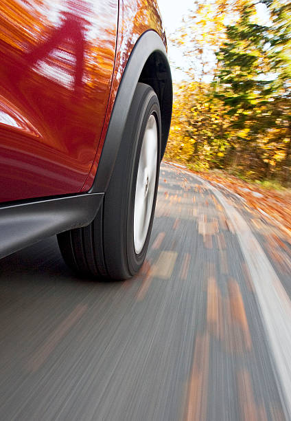 istock Driving a car in the autumn 179423787