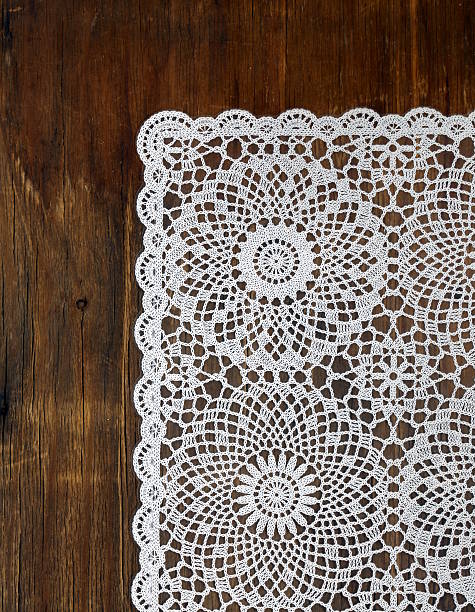 istock wooden background with white lace napkin 179424401