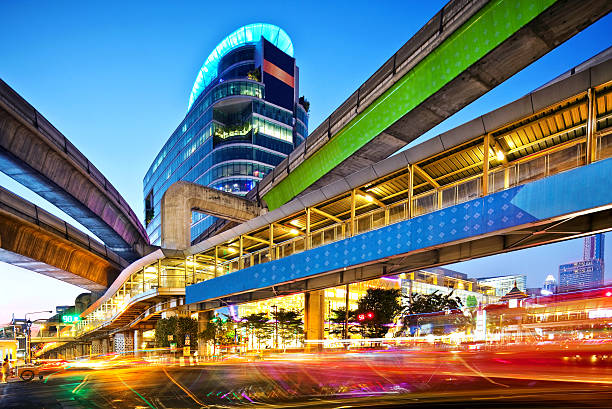 street and shopping centre in Bangkok at dusk