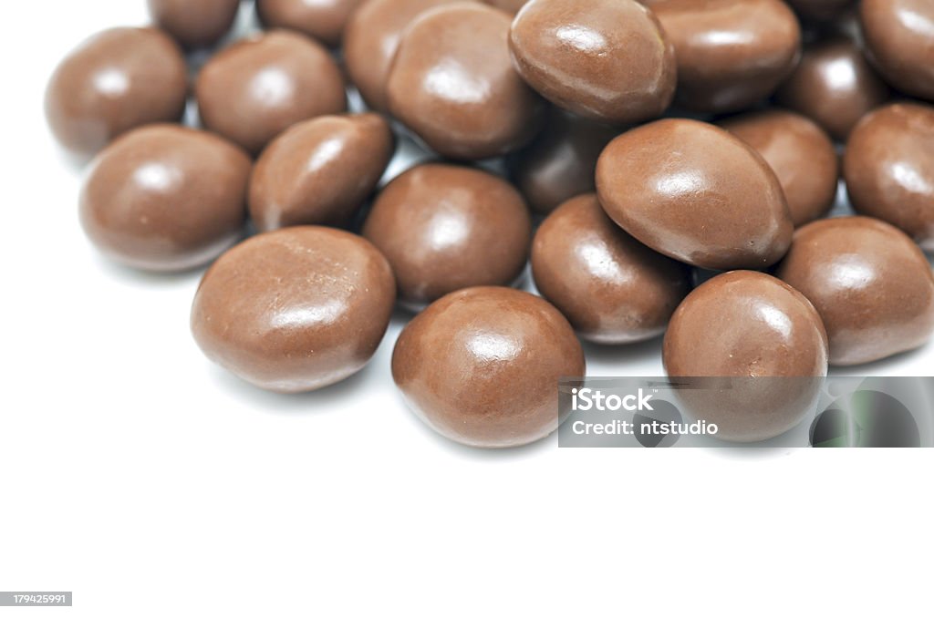 chocolate balls cereal chocolate balls on a white Brown Stock Photo