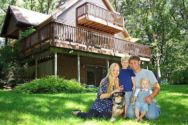 istock Happy Family Outside by Cabin 179426993
