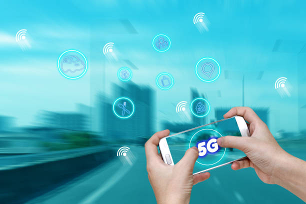 istock 5G network interface and icon concept,hand holding mobile smart phone with cityscape 1794277314