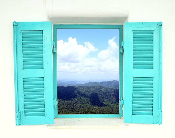 istock Greek style window with mountain and sky view 179428625
