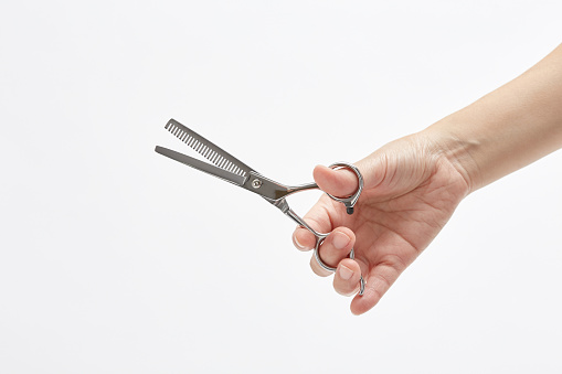 a hand with scissors