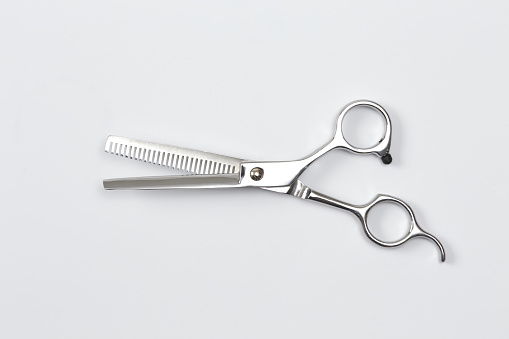 a pair of scissors with a white background