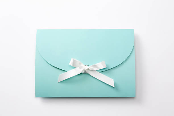 istock a blue paper gift box with a ribbon 1794298790