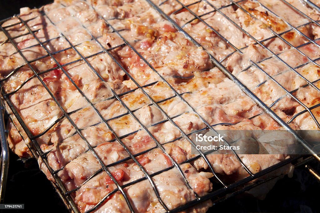 Cucinare carne - Foto stock royalty-free di Agnello arrosto