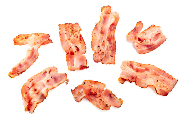 istock Fried bacon slices isolated on white. 1794329278