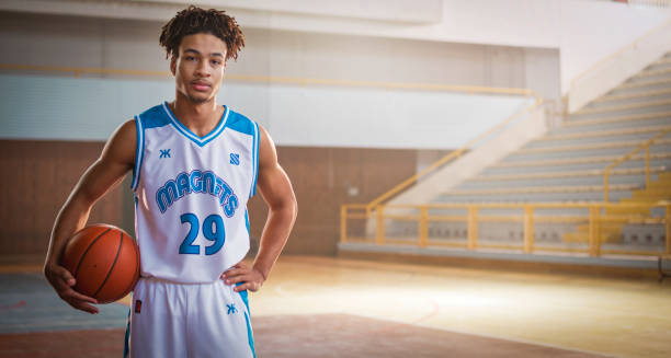 istock Young man standing on sports court 1794334575