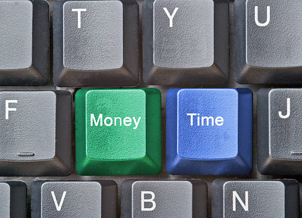 istock Keyboard with money and time keys 179435464