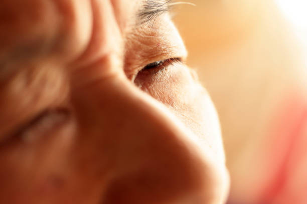istock Close-up of an elderly woman's eyes with a depressed expression 1794367352