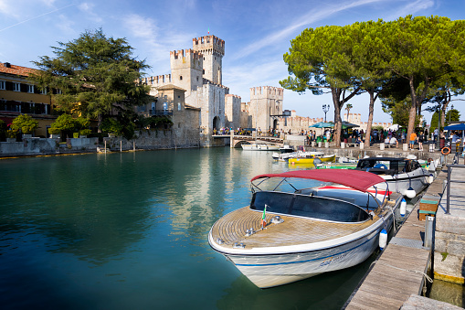 Holidays in Italy - Scenic view of the marina in the tourist resort of Sirmione on Lake Garda