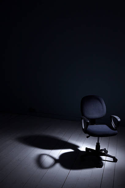 istock Office Chair Under The Spotlight 179441071