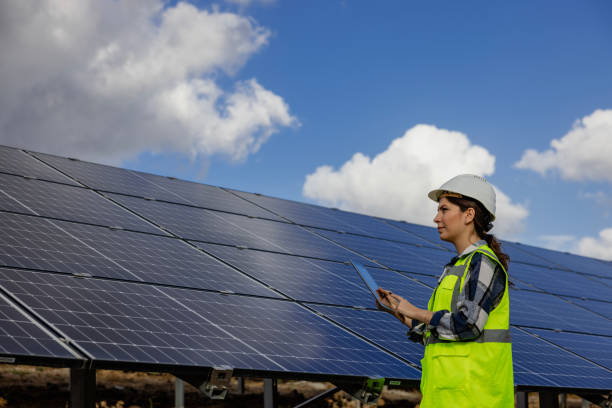 istock Woman engineer working in solar panel power plant 1794444706