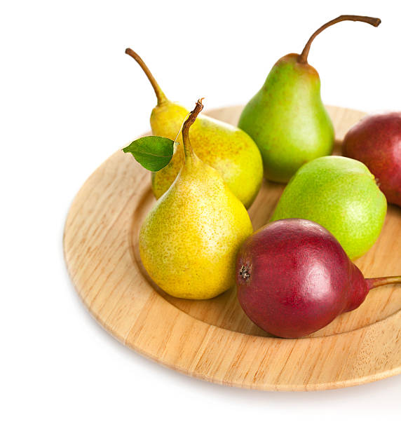 istock fresh pears on the wooden plate 179445187