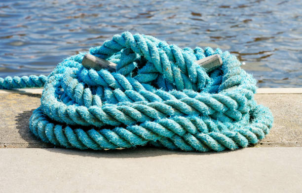 istock Blue rope at the harbor. Maritime detail. 1794453824