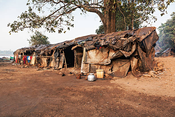 Slum Slum house near the river, Goa, India village maharashtra stock pictures, royalty-free photos & images