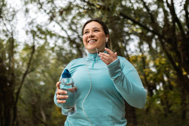istock Woman Celebrating the Run 1794470952
