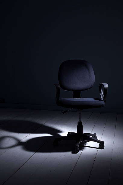 istock Office Chair Under The Spotlight 179447370
