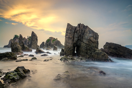 The gold Sunset Scenery of gigi hiu beach, lampung, sumatera