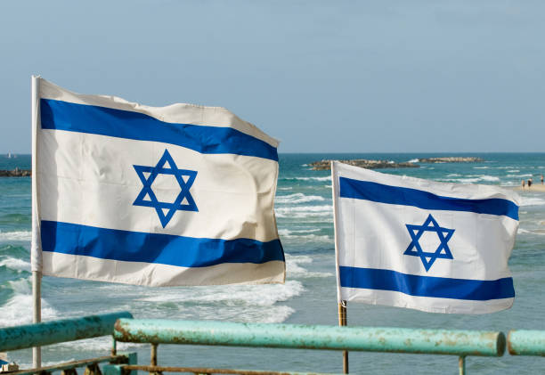 istock Israeli flags waving in the wind 1794523002