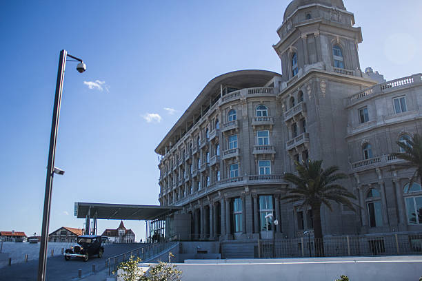 istock Hotel Carrasco with Old Car Driving Away 179452404