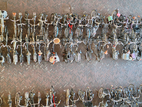 Bicycles parked in rows at train and metro station Duivendrecht near Amsterdam in the Netherlands