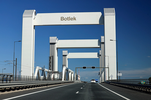 Botlekbrug bridge over the Oude Maas river in the Botlek harbor at the port of Rotterdam