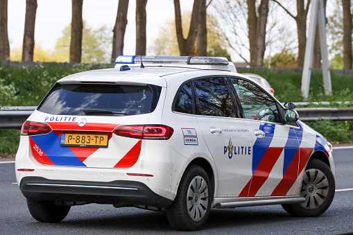 police car after car crash on Motorway A20 at Nieuwerkerk aan den IJssel in the Netherlands