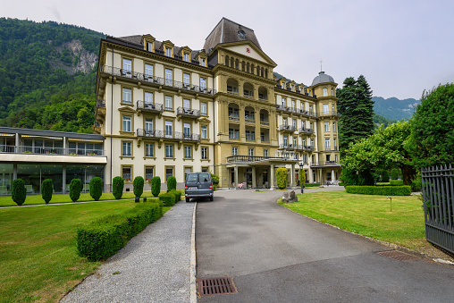 Interlaken, Switzerland - June 20, 2023: Five star Lindner Grand Hotel Beau Rivage located nearby city center