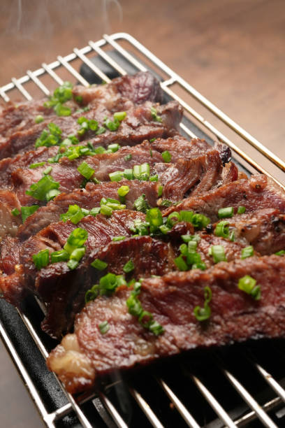 istock Grilled striploin beef steak served on grill, indoors 1794571837