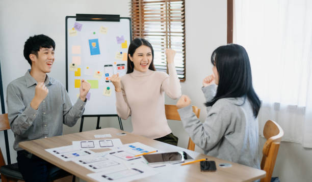 istock Close up view of UI developer team brainstorming on their project with laptop, smartphone and digital tablet. 1794577475