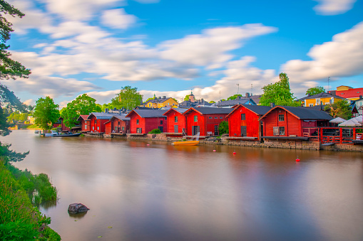 Classical view of the city of Porvoo, the second-oldest city of Finland. The old church is in the background and red wooden houses in the foreground.