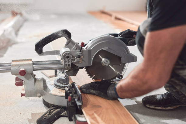 istock Professional handyman installing laminate flooring in a new apartment. 1794587126