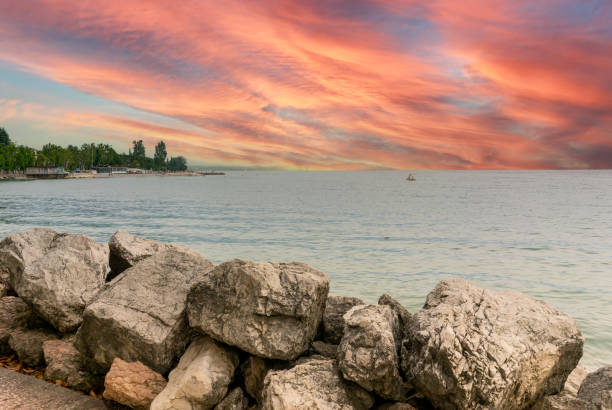 istock sunset on the lake garda in italy 1794610176